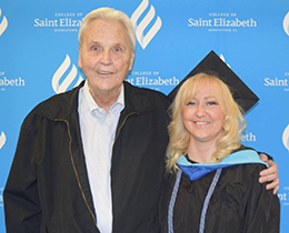 Heidi and Roger Biller pose together on Heidi's graduation day.