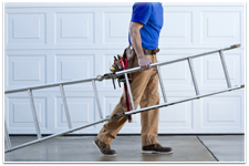 man carrying ladder