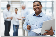 IT department holding a laptop